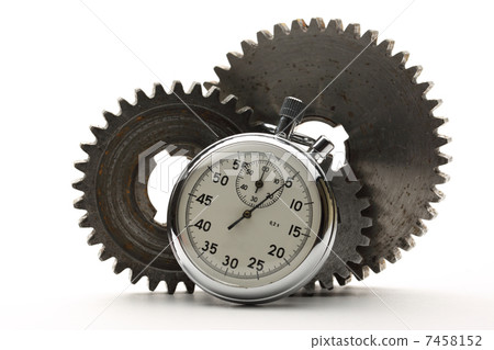 Three steel cogwheels and stopwatch 7458152
