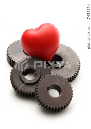 Steel cogwheels and red heart 7458154