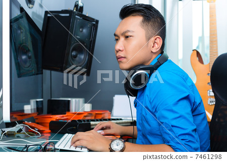 Indonesian man in recording studio 7461298