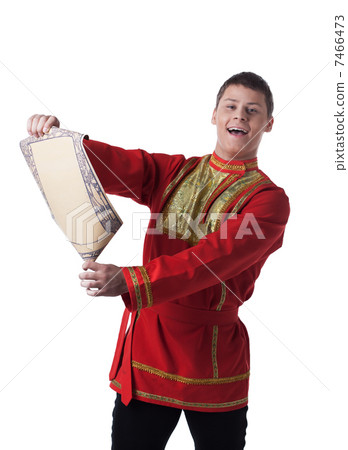 Dancer in russian costume with paper 7466473