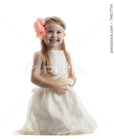 Happy little girl in long dress Happy little girl in long dress 7467754