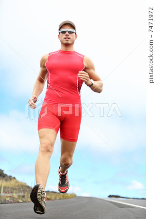 Triathlete running man Triathlete running man 7471972
