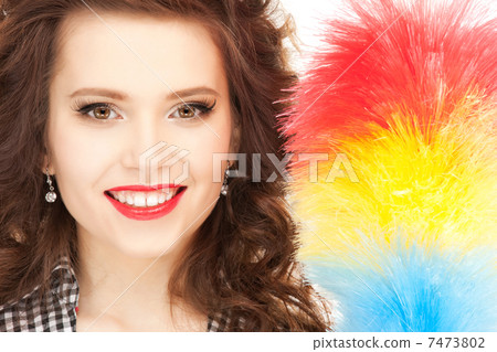 beautiful woman with cleaning sweep 7473802