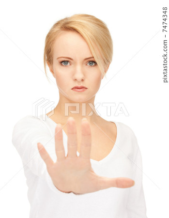 woman making stop gesture woman making stop gesture 7474348