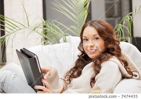 happy woman with tablet pc computer 7474435