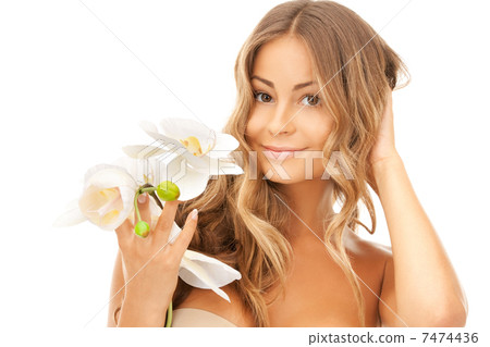 beautiful woman with orchid flower 7474436