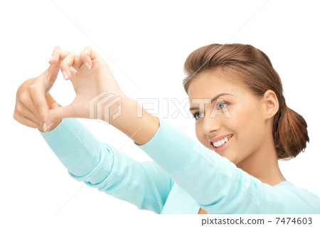 lovely woman creating a frame with fingers lovely woman creating a frame with fingers 7474603