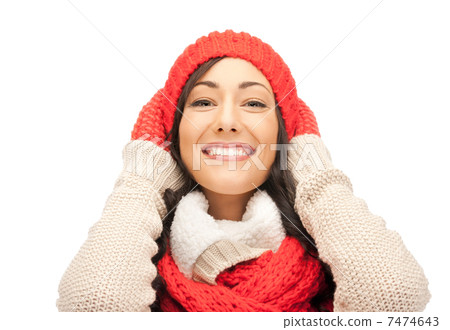 beautiful woman in hat, muffler and mittens 7474643