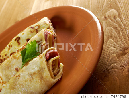 rolled pancakes stuffed ham and cheese. rolled pancakes stuffed ham and cheese. 7474798