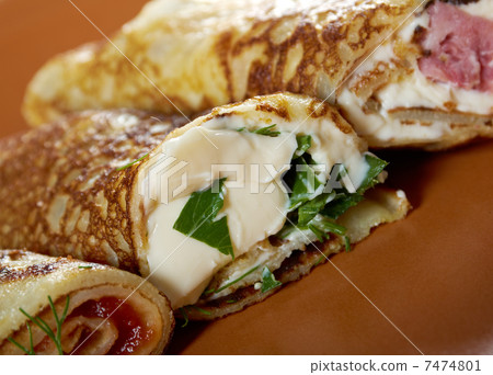 rolled pancakes stuffed ham and cheese. rolled pancakes stuffed ham and cheese. 7474801