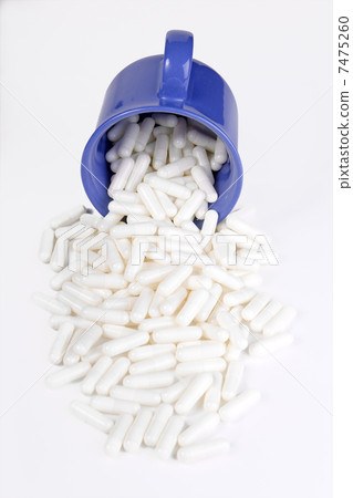 pills in mug pills in mug 7475260