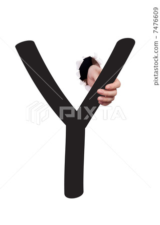 Hand breaking paper surface holding letter 'Y' 7476609
