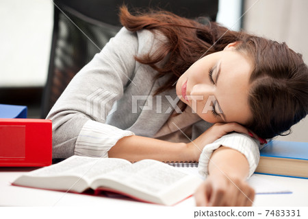 sleeping woman with book 7483331