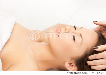 beautiful woman in massage salon 7484239