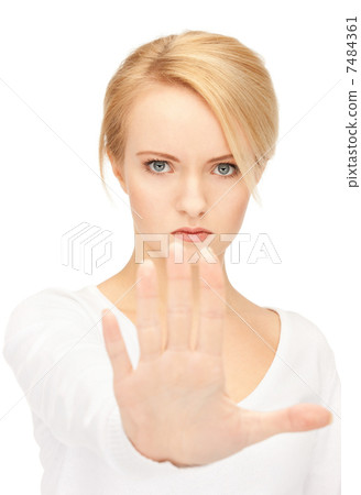 woman making stop gesture 7484361