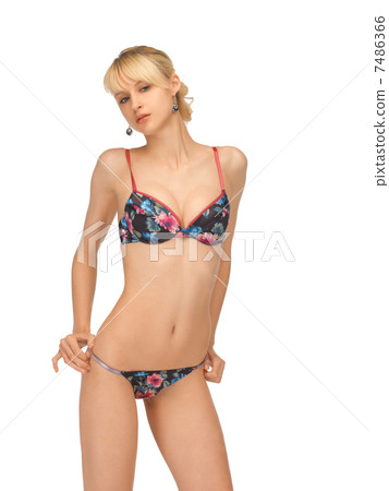 undressing woman in sexy lingerie undressing woman in sexy lingerie 7486366