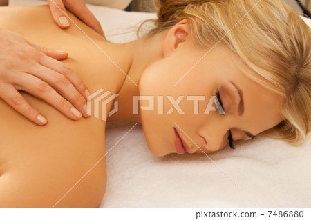 beautiful woman in massage salon 7486880
