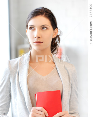 calm and serious woman with book calm and serious woman with book 7487500