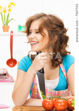 beautiful woman in the kitchen beautiful woman in the kitchen 7487501