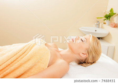 beautiful woman in spa salon 7488431