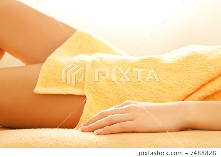 female hands and legs in spa salon 7488828