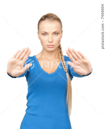 woman making stop gesture 7489004