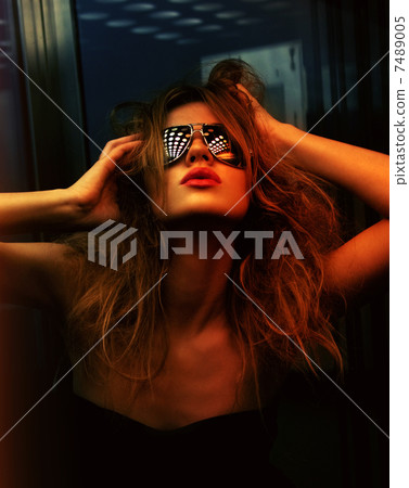 fashionable woman in nightclub 7489005
