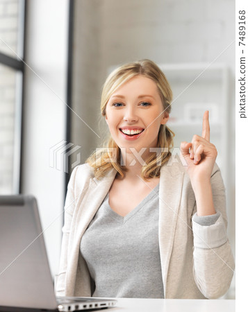 woman with laptop and finger up woman with laptop and finger up 7489168