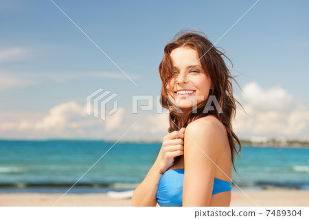 happy smiling woman on the beach happy smiling woman on the beach 7489304