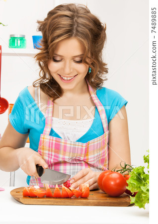 beautiful woman in the kitchen beautiful woman in the kitchen 7489885
