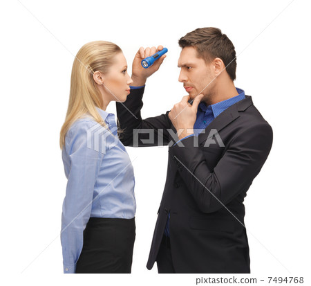 man and woman with flashlights 7494768