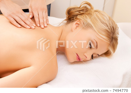 beautiful woman in massage salon 7494770
