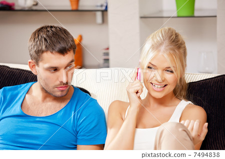 couple with cellphone 7494838