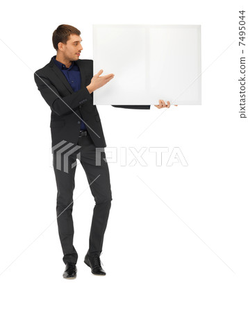 handsome man in suit with a blank board 7495044