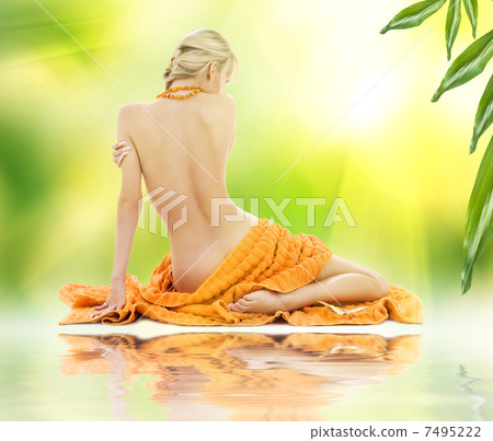 beautiful woman in spa with towels 7495222