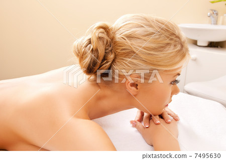 beautiful woman in spa salon 7495630