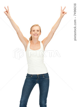 girl in blank white t-shirt showing victory sign girl in blank white t-shirt showing victory sign 7496638