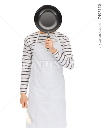 man with pan and spoon 7497150