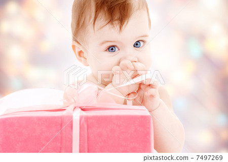 baby boy with gift box 7497269