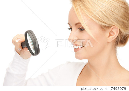 woman with magnifying glass woman with magnifying glass 7498079