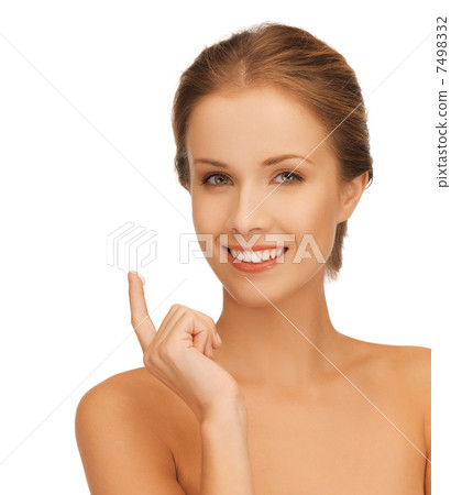 beautiful woman with moisturizing creme drop 7498332