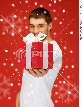 handsome man with a gift handsome man with a gift 7498458