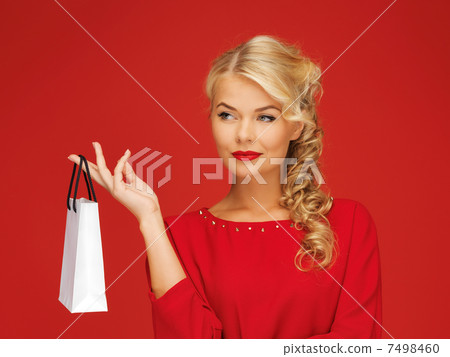 lovely woman in red dress with shopping bag lovely woman in red dress with shopping bag 7498460