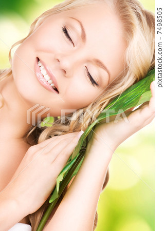 woman with green leaf woman with green leaf 7498505