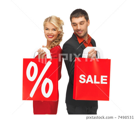 man and woman with shopping bag man and woman with shopping bag 7498531