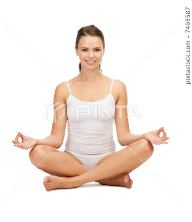 woman in undrewear practicing yoga lotus pose 7498587