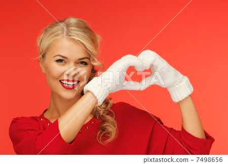 lovely woman showing heart shape 7498656