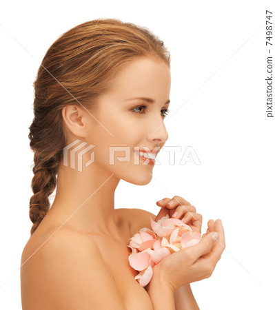 beautiful woman with rose petals beautiful woman with rose petals 7498747
