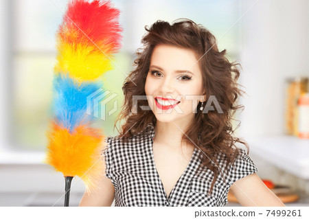 beautiful woman with cleaning sweep beautiful woman with cleaning sweep 7499261