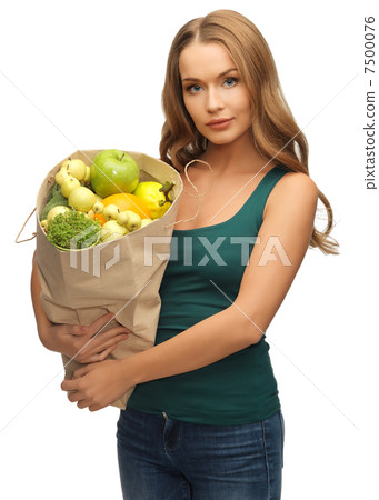 woman with shopping bag full of fruits woman with shopping bag full of fruits 7500076